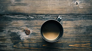 A cup of coffee on a table